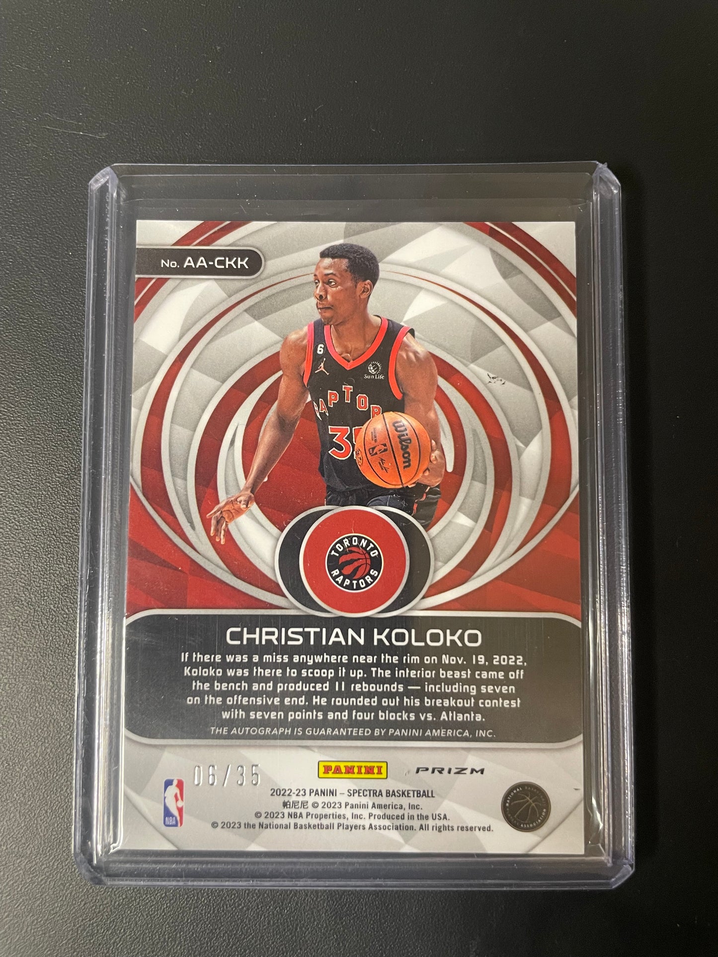 2022/23 Panini Spectra #229 Christian Koloko Toronto Raptors Aspiring Rookie Auto Astral 06/35